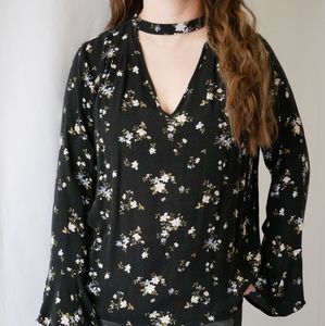 Bell sleeved open neck blouse